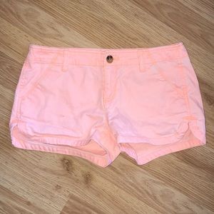 Peach/salmon colored shorts